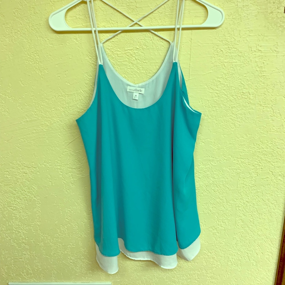 Teal and white criss cross tank